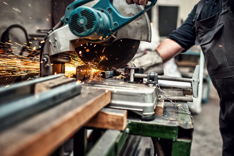 worker using a circular saw